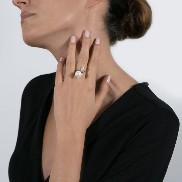 The model wears the my song ring with freshwater pearl and diamonds