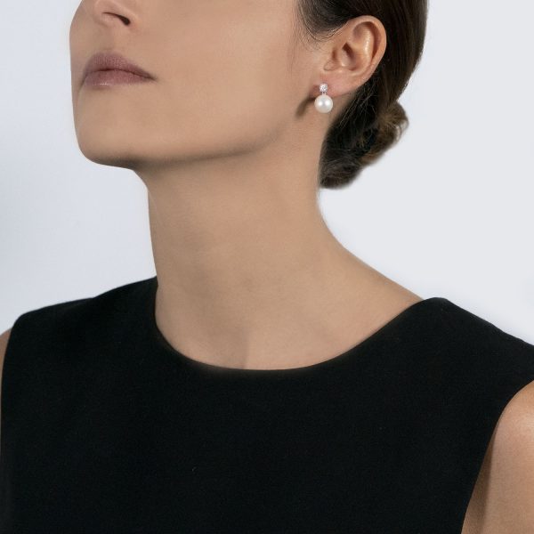 The model wears the my song earrings with freshwater pearls and diamonds