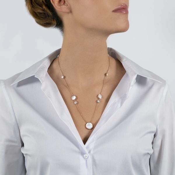 The model wears Venus collection necklace with freshwater pearls mother of pearl and diamonds